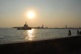 Venice view from the giardini shore with freight ship Venice view from the giardini shore with freight ship